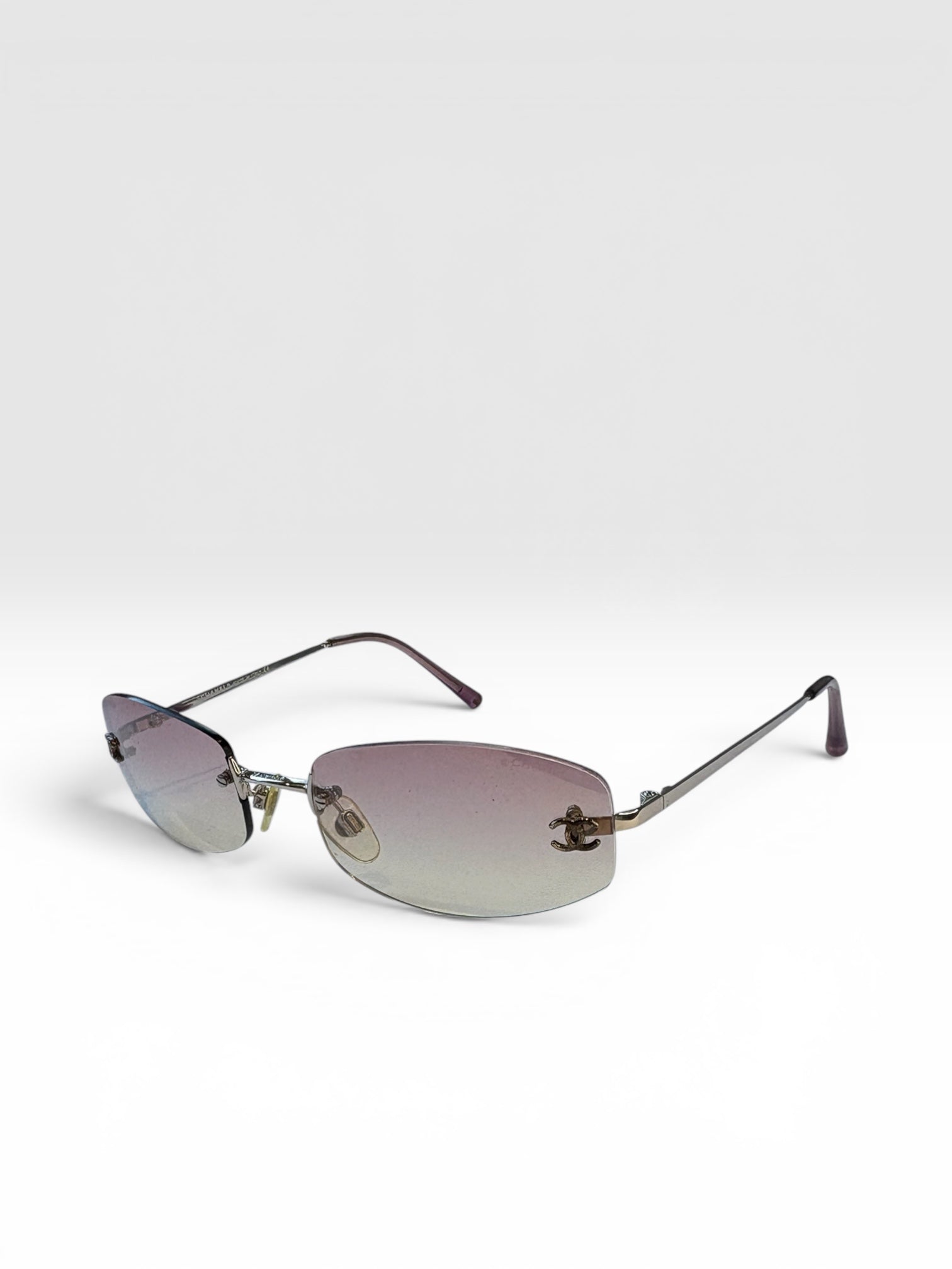 Chanel Pink Rimless Sunglasses