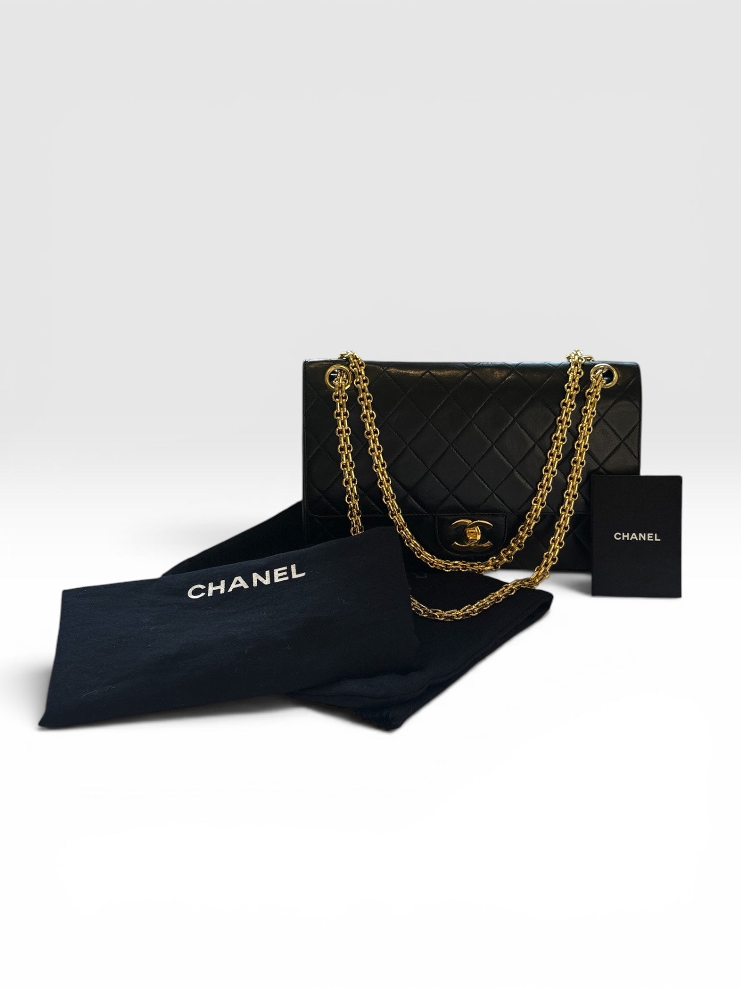 Chanel Classic Flap Bag (Medium) in Black Lambskin