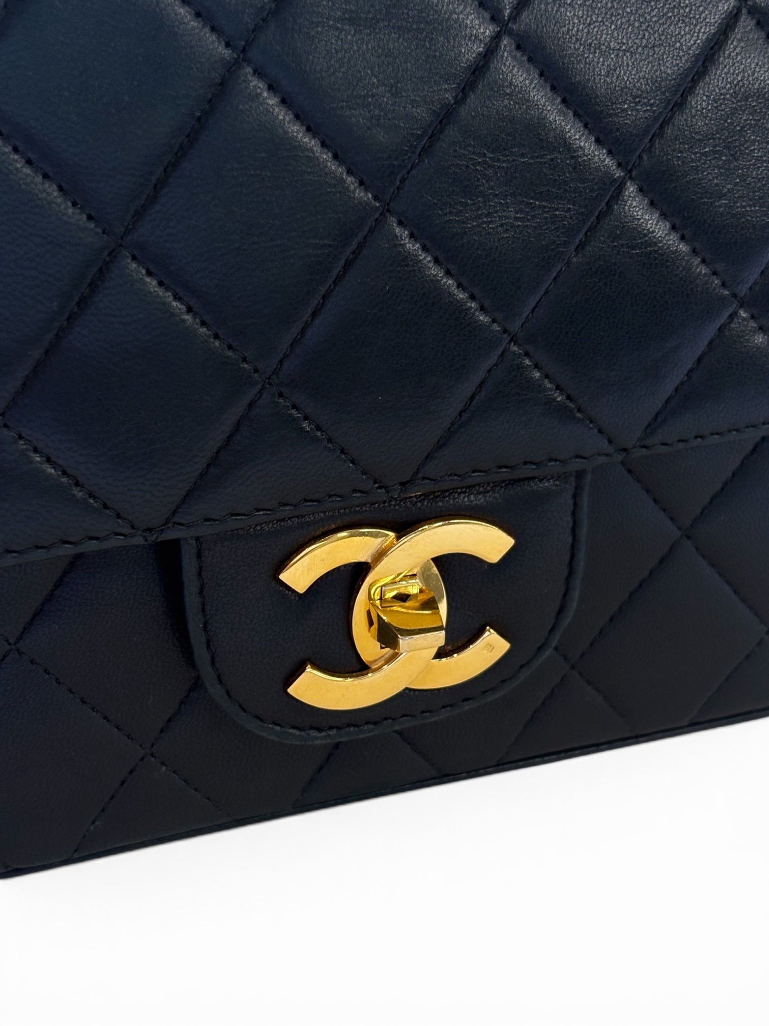Chanel Classic Flap Bag (Medium) in Black Lambskin