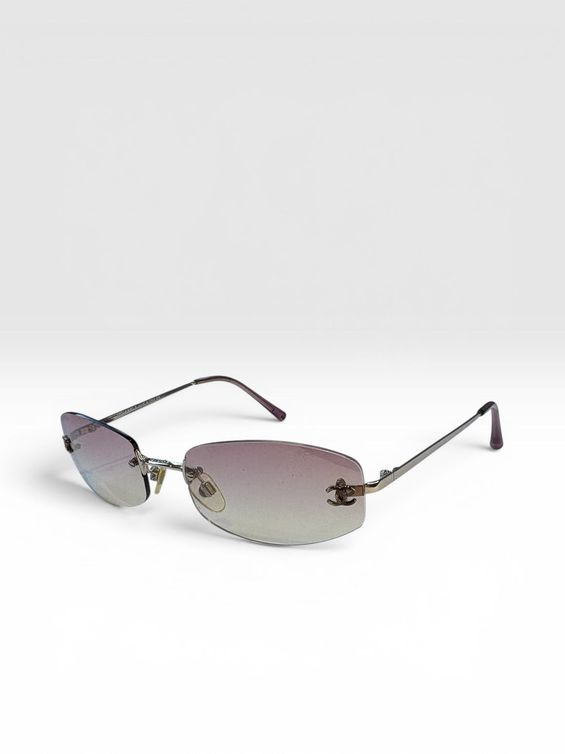 Chanel Pink Rimless Sunglasses