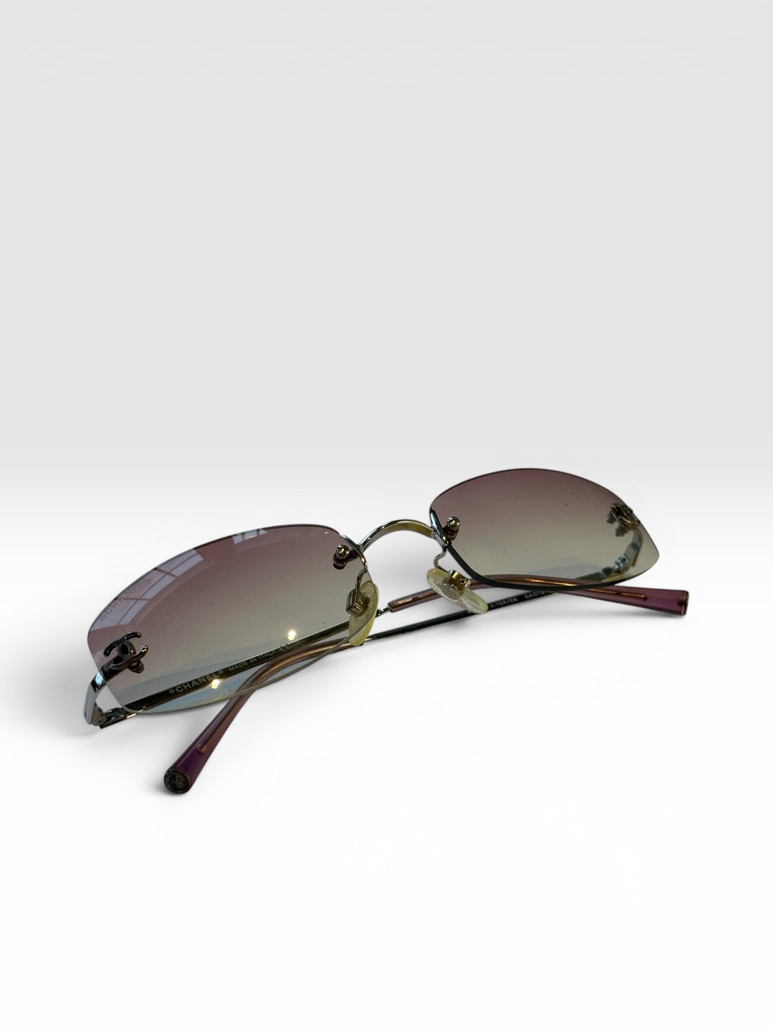 Chanel Pink Rimless Sunglasses