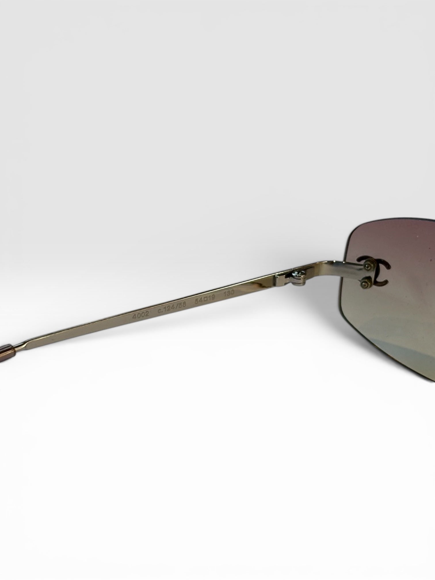 Chanel Pink Rimless Sunglasses