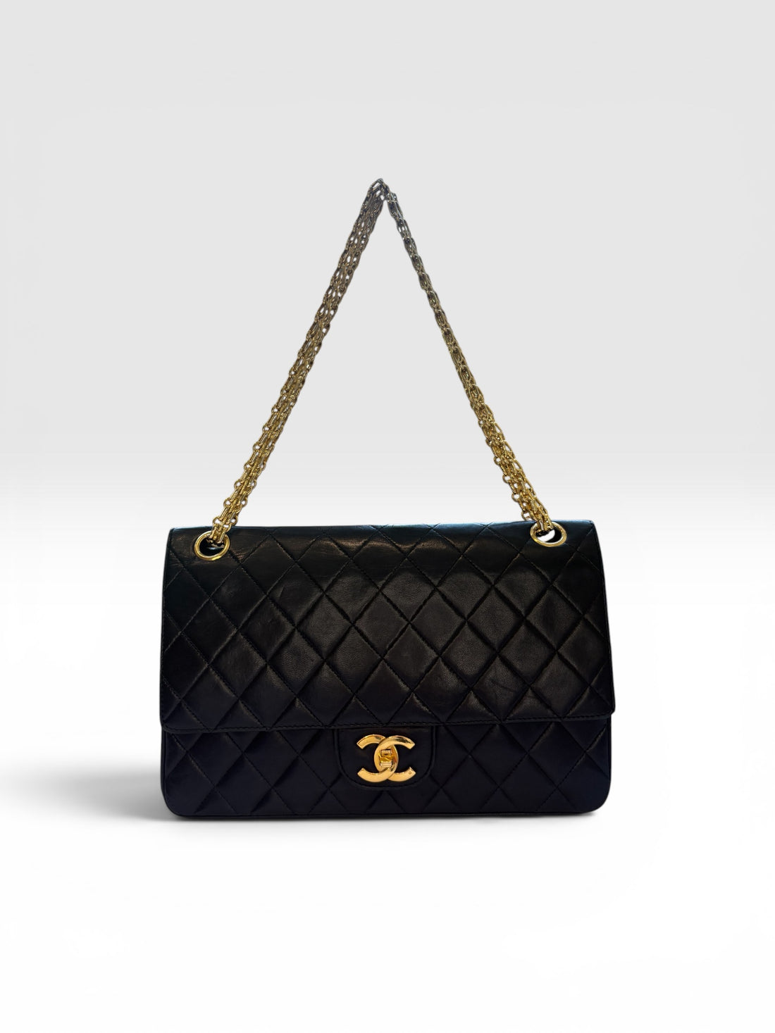 Chanel Classic Flap Bag (Medium) in Black Lambskin