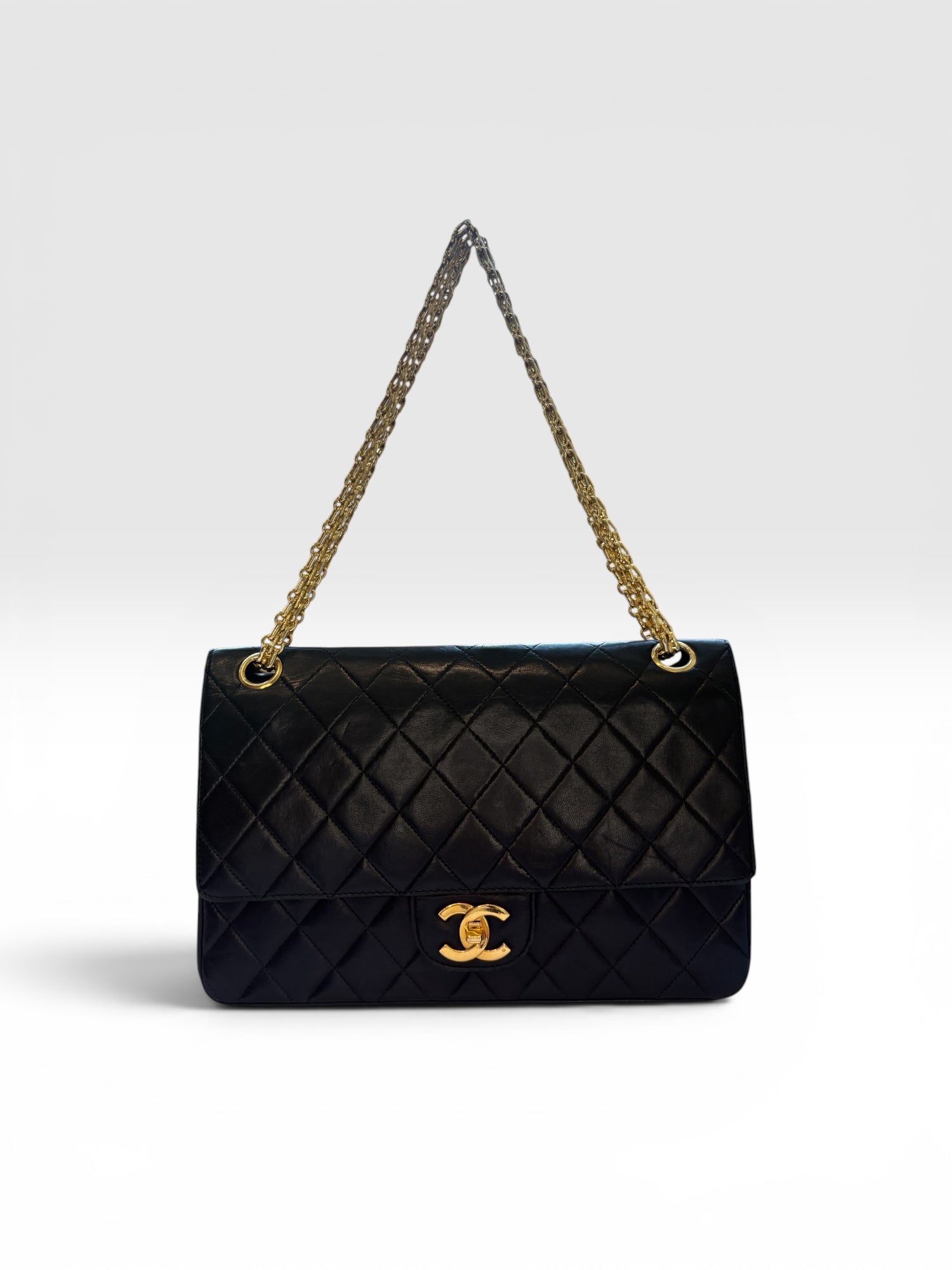 Chanel Classic Flap Bag (Medium) in Black Lambskin