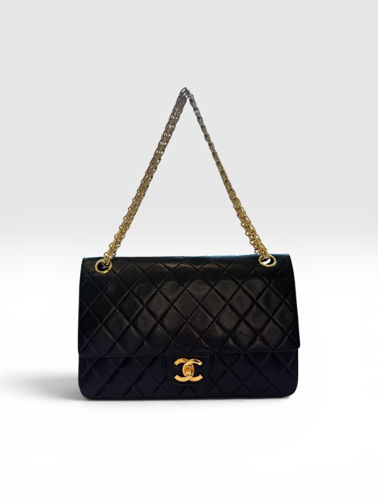 Chanel Classic Flap Bag (Medium) in Black Lambskin