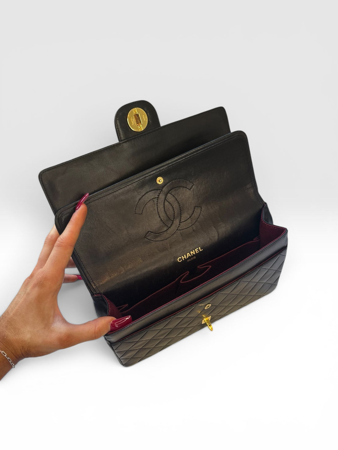 Chanel Classic Flap Bag (Medium) in Black Lambskin
